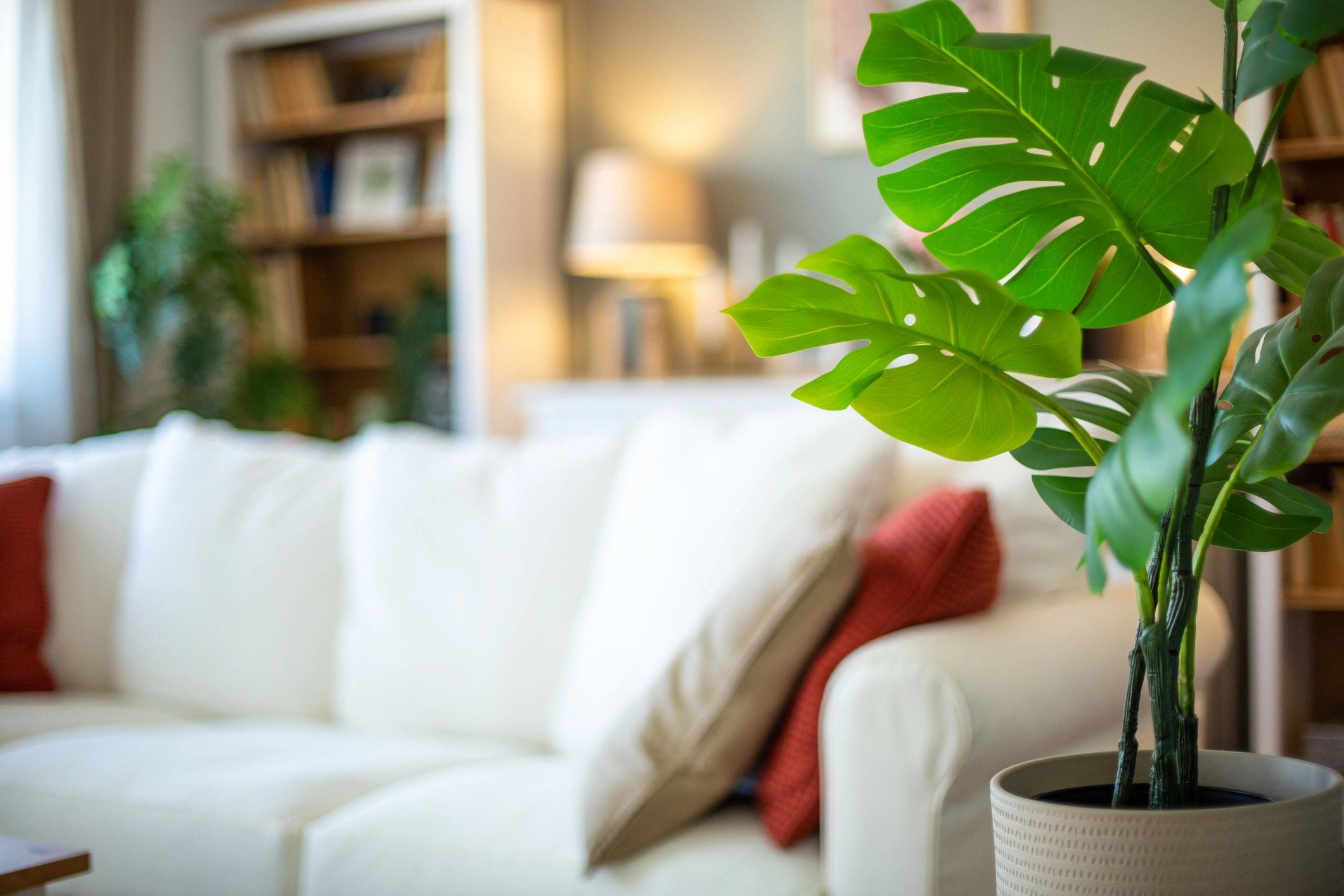Interior styling detail with greenery in a modern living room