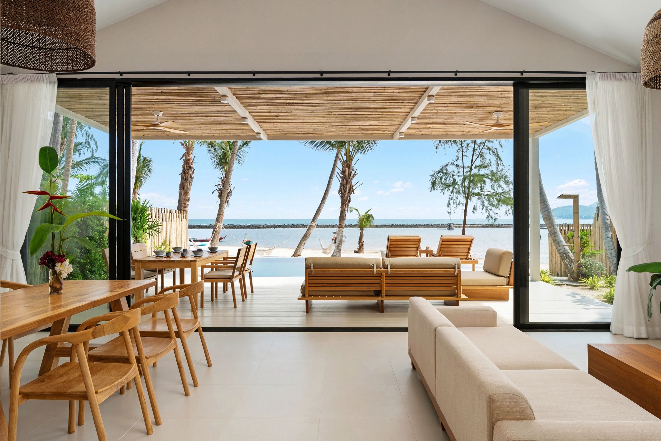 Elegant open-plan living room designed with warm, refined finishes